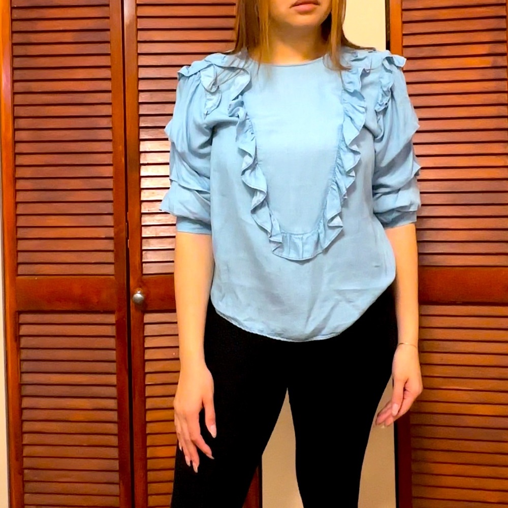 Ruffle blue top